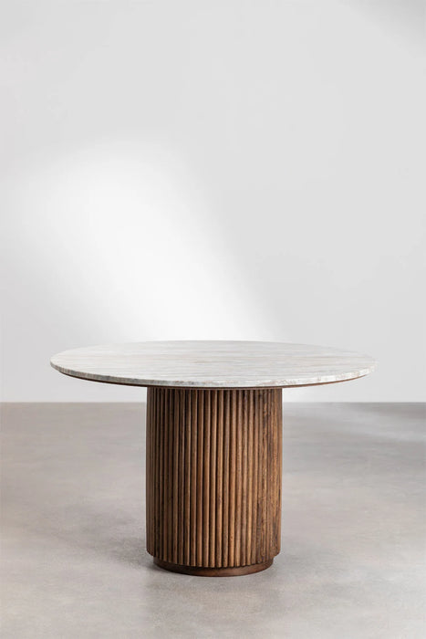 Round dining table made of natural stone and mango wood Giselda