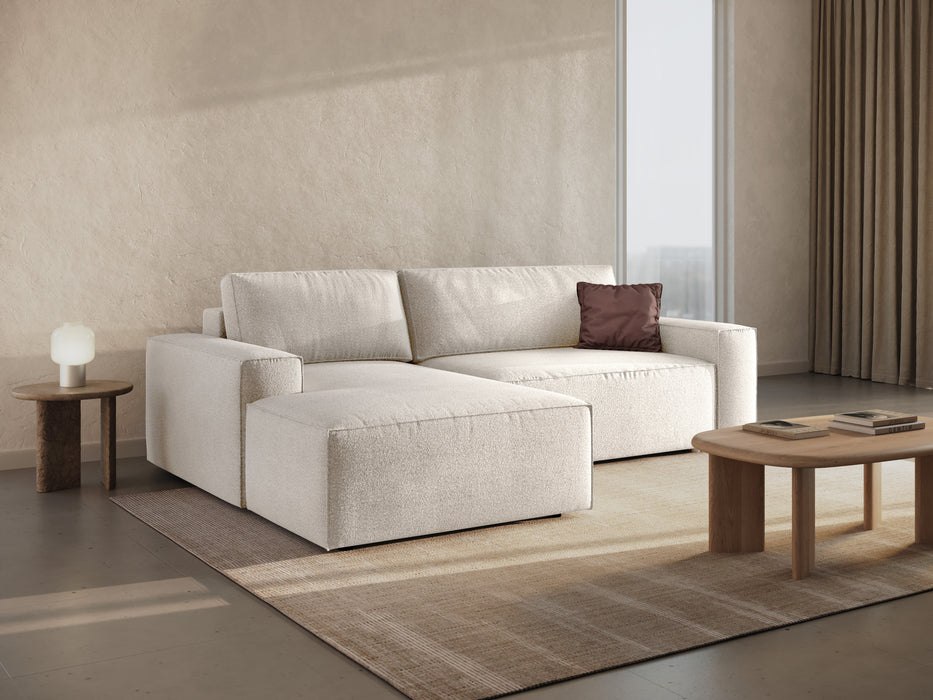 Kampinė bouclé sofa-lova su dėže Jodie