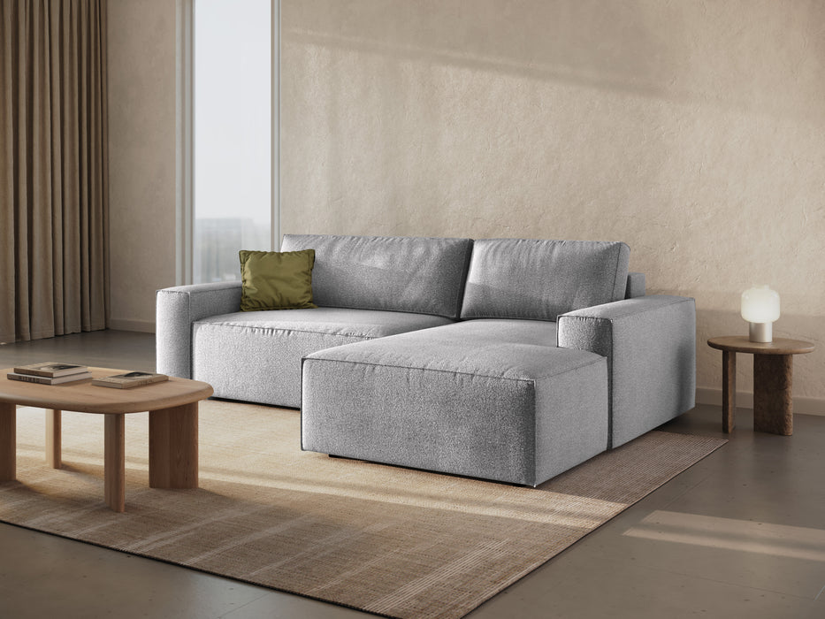 Kampinė bouclé sofa-lova su dėže Jodie