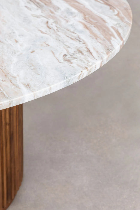 Round dining table made of natural stone and mango wood Giselda