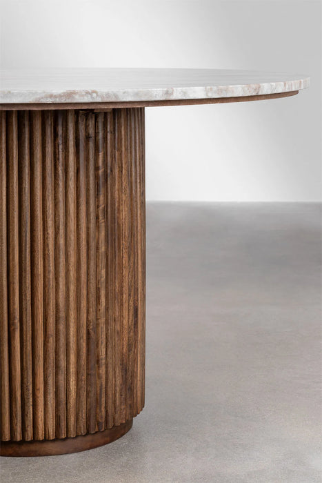 Round dining table made of natural stone and mango wood Giselda